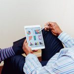 man with an iPad in his hands