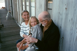 grandparents holding grandchild in Canada